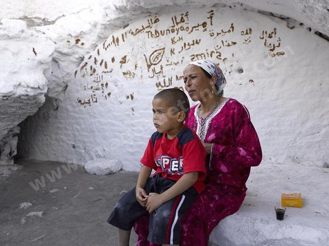 Le sanctuaire de la Mokhola est un lieu saint situé dans les citernes romaines d'Aïn El Hammam sur le site archéologique romain de Dougga. Le lieu est encore vénéré par les habitants de la région qui viennent y prier et chaque année faire des sacrifices. La paroi intérieure de la citerne, située à l'entrée du couloir de canalisation, est couverte de chaux et d'écriture au henné. Dans la grotte sombre les habitants viennent tout au long de l'année faire des offrandes et des voeux.