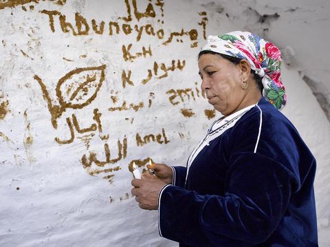 Le sanctuaire de la Mokhola est un lieu saint situé dans les citernes romaines d'Aïn El Hammam sur le site archéologique romain de Dougga. Le lieu est encore vénéré par les habitants de la région qui viennent y prier et chaque année faire des sacrifices. La paroi intérieure de la citerne, située à l'entrée du couloir de canalisation, est couverte de chaux et d'écriture au henné. Dans la grotte sombre les habitants viennent tout au long de l'année faire des offrandes et des voeux.