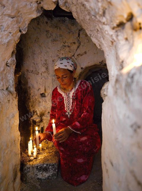 Le sanctuaire de la Mokhola est un lieu saint situé dans les citernes romaines d'Aïn El Hammam sur le site archéologique romain de Dougga. Le lieu est encore vénéré par les habitants de la région qui viennent y prier et chaque année faire des sacrifices. La paroi intérieure de la citerne, située à l'entrée du couloir de canalisation, est couverte de chaux et d'écriture au henné. Dans la grotte sombre les habitants viennent tout au long de l'année faire des offrandes et des voeux.