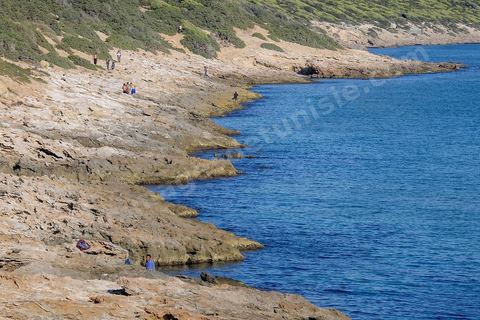 Sidi el Mekki Beach is famous for its location between the hill and its beautiful white sand. The beach runs along the cape of the same name. 