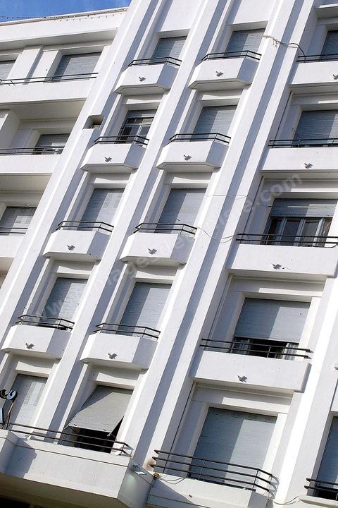 The European-style facade of the Le Colisée building on Habib Bourguiba Avenue in Tunis