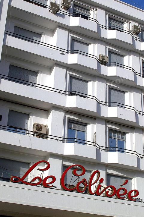 The European-style facade of the Le Colisée building on Habib Bourguiba Avenue in Tunis