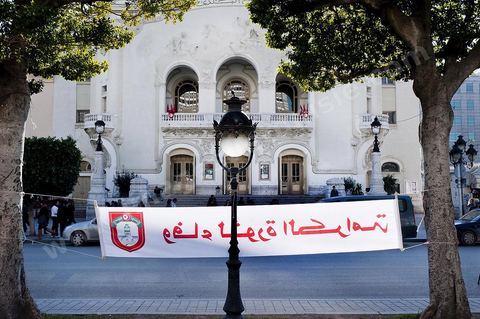 On January 13, on Habib Bourguiba Avenue across from the Municipal Theater, a banner calls for “loyalty to the Revolution of Dignity.”