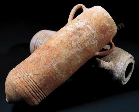 Two cylindrical Punic trade amphorae from the Hellenistic period (4th–2nd centuries B.C., Carthage Museum).