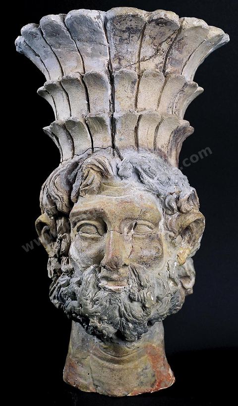 Baal Hammon. A beautiful terracotta head of a male deity, easily recognizable as the great Punic god Baal Hammon. Highly expressive, it still bears traces of vermilion. (H. 30 cm, Sanctuary of Salammbo, Carthage, mid-2nd century B.C., Carthage Museum)