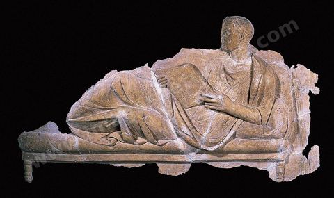 Funeral bas-relief in stucco. The reclining figure is shown reading, a motif frequently used in funerary art that tends to evoke the intellectual qualities of the deceased. Museum of Carthage.