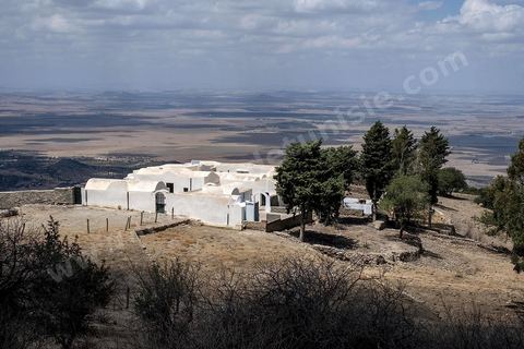 The Sidi Bougabrine Mausoleum on the slopes of Jebel Zaghouan. Zaghouan is an agricultural town of Roman origin (Ziqua) built at the foot of Jebel Zaghouan (1,295 m) and rich in spring-fed fountains. It is a charming little medina clinging to the slopes of the wooded hill. Its sacred architecture reflects deep Andalusian influences, as a community of Andalusian refugees settled there in the 17th century. 